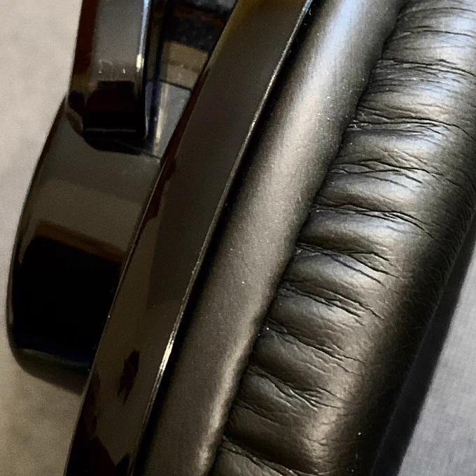 Close up of the side of a black headset