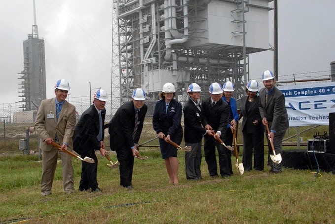 (from left) Rep. Thad Altman; Lt. Gov. Jeff Kottkamp; Elon Musk; Brig. Gen. Susan Helms, Commander of the 45 Space Wing; Brevard County EDC CEO Lynda Weatherman; Steve Koehler, President Space Florida; Janet Petro, Deputy Director of NASA KSC; Patricia Grace Smith, FAA Associate Administrator for Commercial Space Transportation; Steve Cain, NASA COTS program manager. Image via NASA/George Shelton KSC.