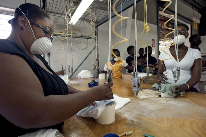 Garment workers in Haiti wearing N95 masks. UN Photo by Eskinder Debebe.
