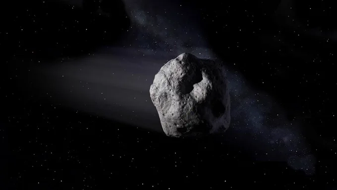 Artists cocept of asteroid traveling  through space. 
