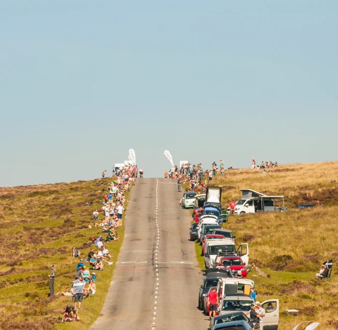 A picture of a road heading up a hill on the Devon Stage of the Tour of Britain. 