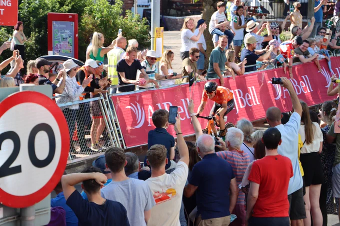 Tour of Britain 2021 Stage 2 winner Robin Carpenter cycles 100 metres from the finish line on Queen Street, Exeter (2021).