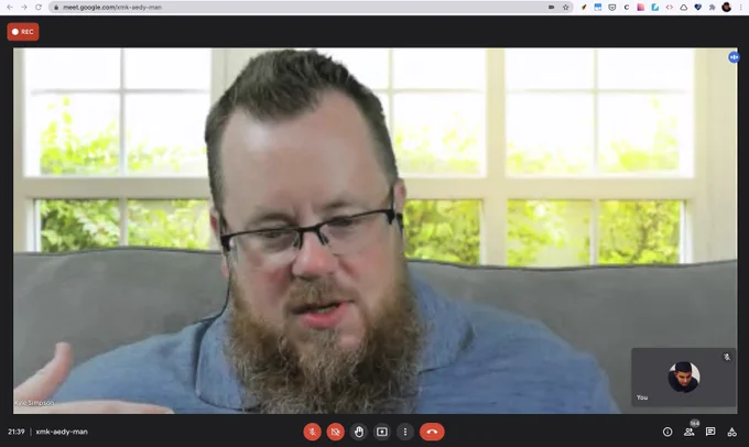 Kyle Simpson speaking to the audience in the hangout call