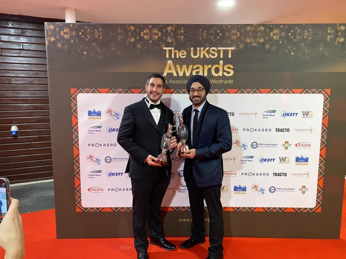 Founders of Headlight AI receiving the awards on behalf of the entire team at Headlight AI