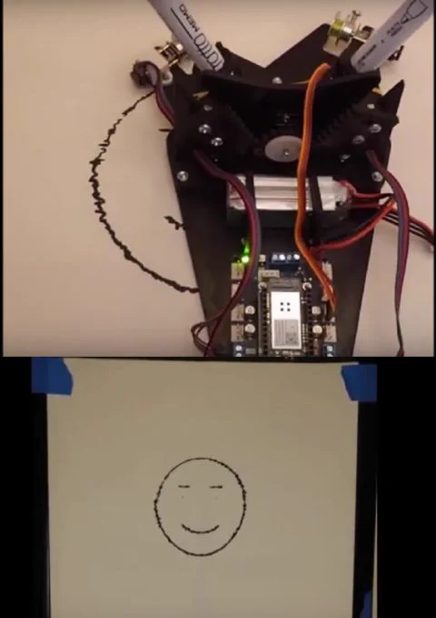 Figure 3. Top: Robot in the process of drawing an image captured from a web cam. Bottom: The completed drawing (from ENGR 415 Fall 2020).