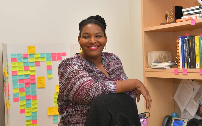 English professor Halcyon Lawrence in their office.