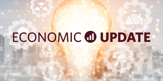 TEXT: economic update. abstract image of gears and lightbulb