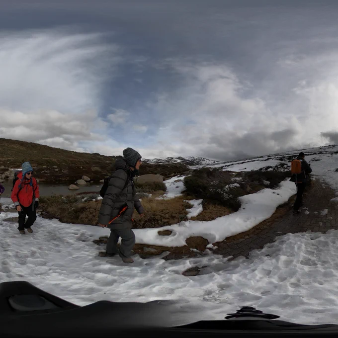 scientists cross alpine creeks and traverse the snowy mountains