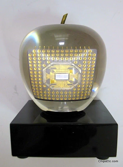 Apple CPU in paperweight from the 1990s