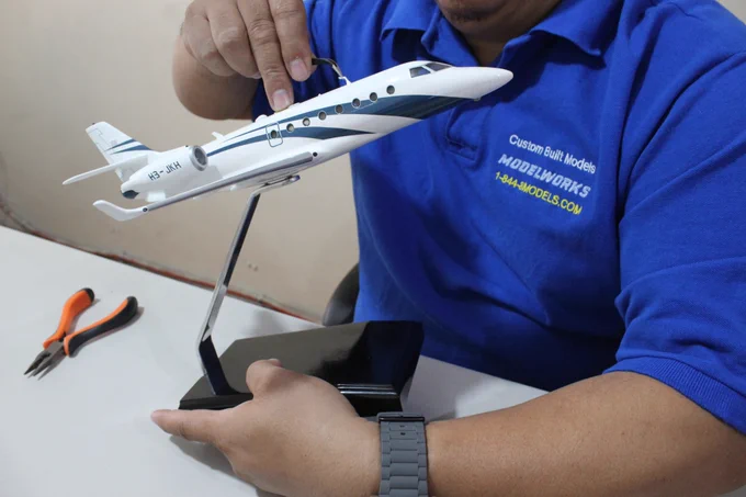 Custom Desktop Model Aircraft Built from Photos, Drawings, Sketches, or Descriptions.  100% Handcrafted and Handpainted by Mastercraftsman. Lead by Lincoln Uson. Master Model Builder and has personally built more than 50,000 models with his bare hands.  