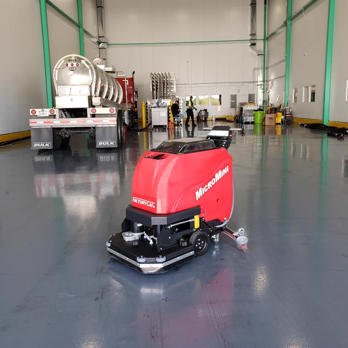 FactoryCat MicroMini Floor Scrubber Cleaning Up After Large Trucks