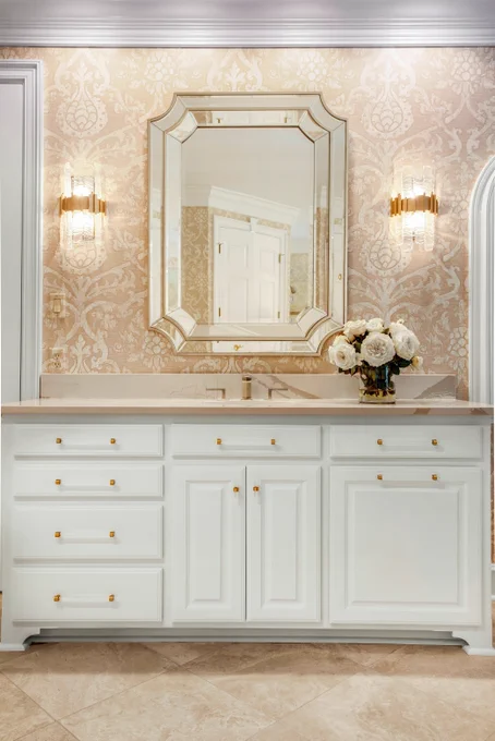 Corbett Lighting Ciro sconces flank a mirror in a bathroom.