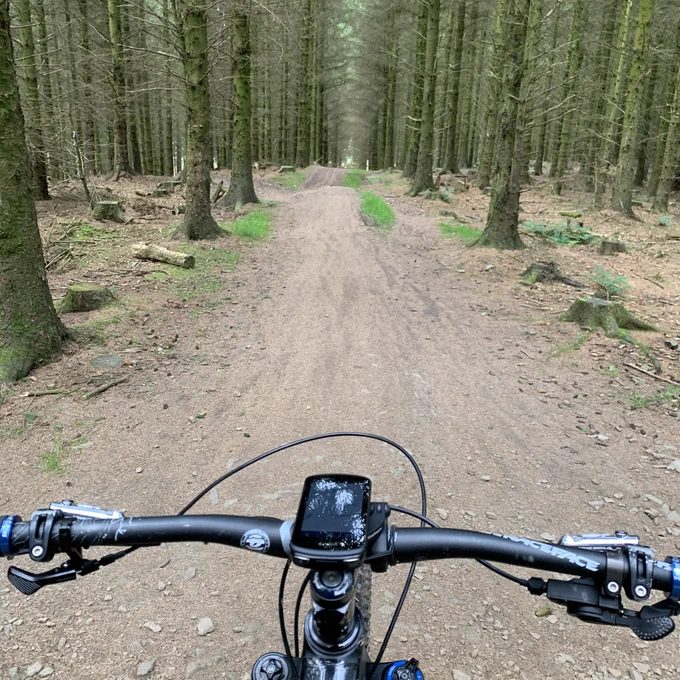 Mountain bike at the start of a black trail at Hopton bike trails