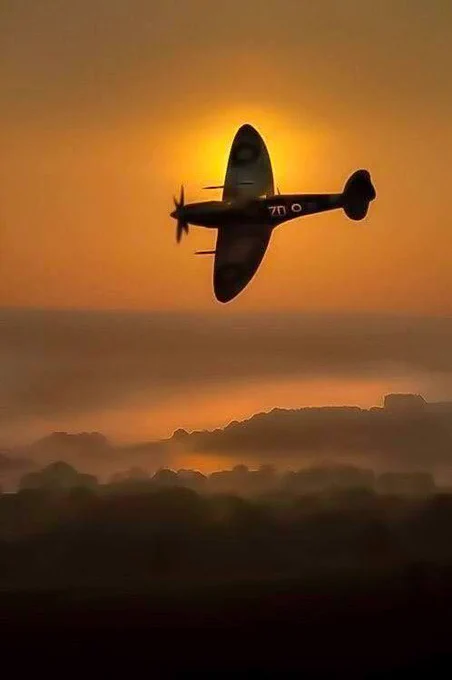 A Spitfire against a golden sunset