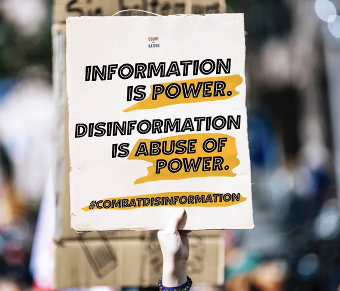 Poster that reads: Information is POWER. Disinformation is ABUSE OF POWER.