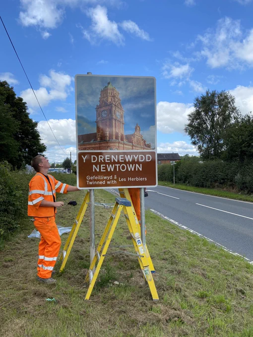 Powys County Council workers doing a great job of the installation !