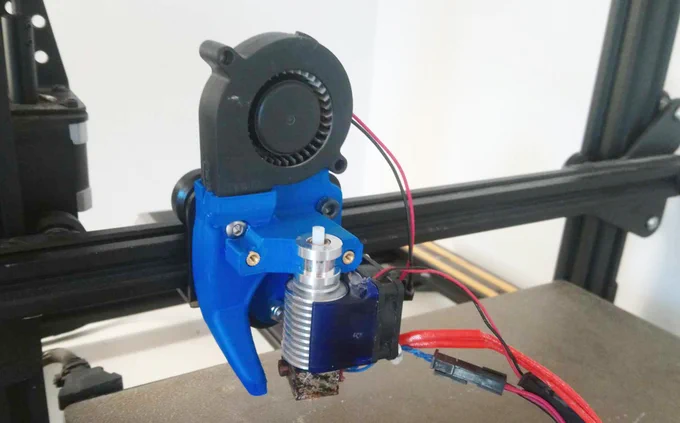 Mount plate with hot end and part cooling fan installed.