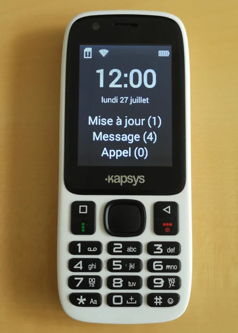 Ecran d'accueil du téléphone MiniVision qui informe de la disponibilité d'une nouvelle mise à jour logicielle