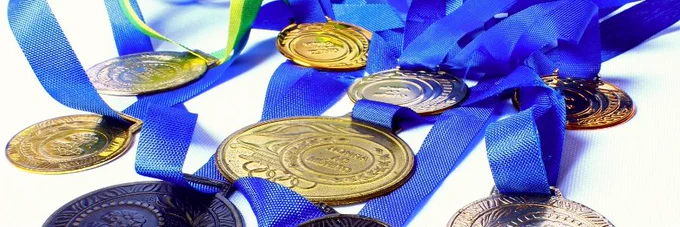 A collection of medals on coloured ribbons