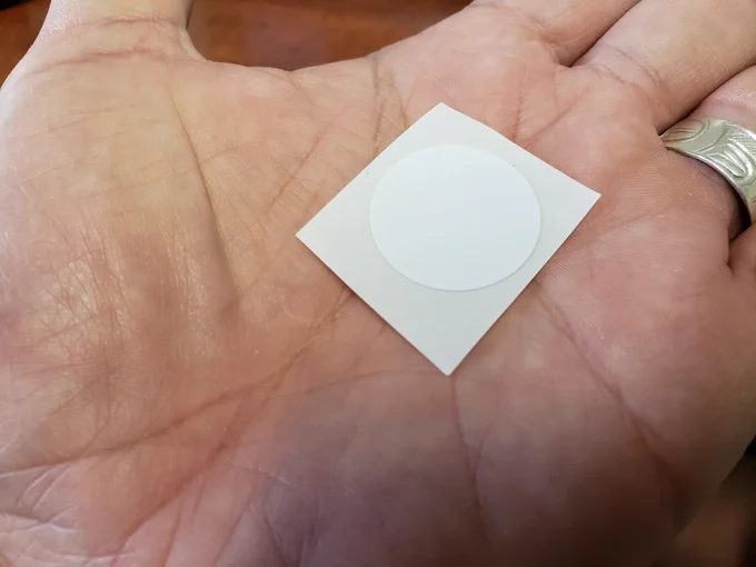 NTAG215 NFC Tag. No, it's not a vaccine patch ouchy-cover.
