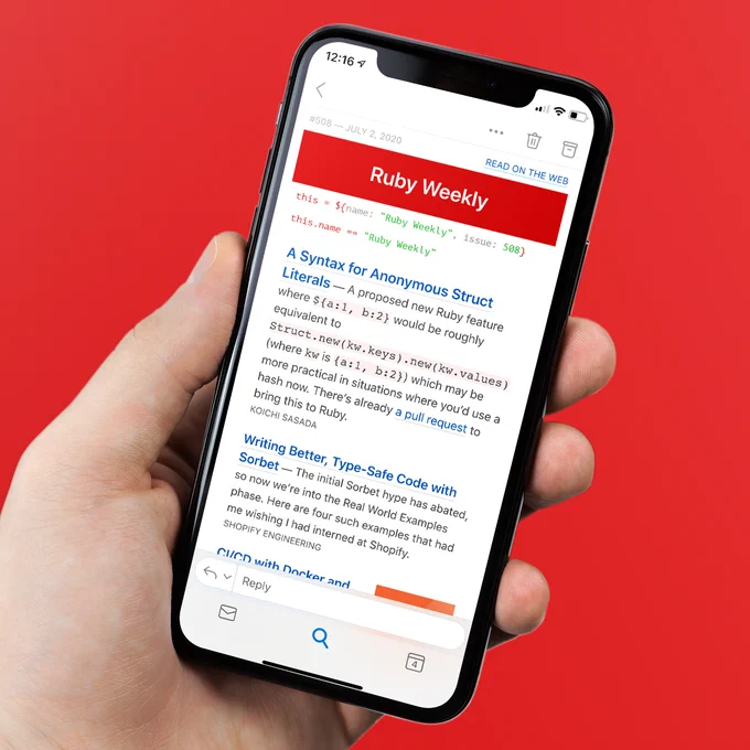 iPhone X in hand showing Ruby Weekly email