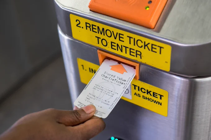 Photo of CharlieTicket being used at a fare vending machine.