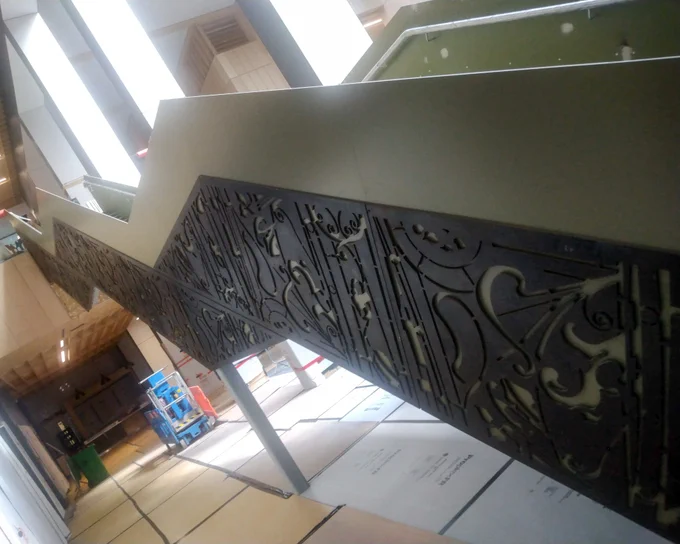 Decorative profile steel cut panelling on the atrium staircase at the School of Architecture and Built Environment building at the Springfield Campus