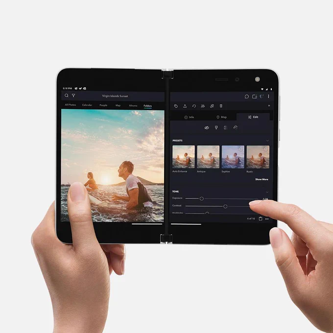 Surface Duo showing both screens being used to edit a single photo.