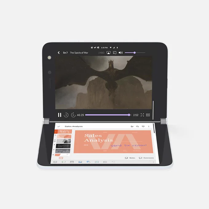 Surface Duo in two-screen, horizontal mode with HBO Max playing on the top screen and a PowerPoint Presentation being edited below. 