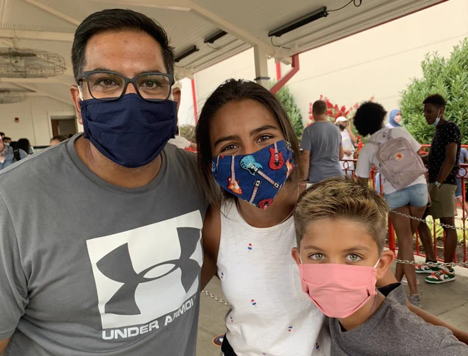 Dr. Christopher and kids wearing their masks at Hershey Park.