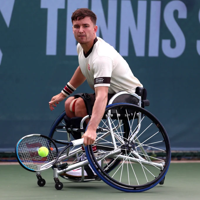 Gordon Reid plays a backhand during the LTA Wheelchair Tennis Series at the National Tennis Centre in London