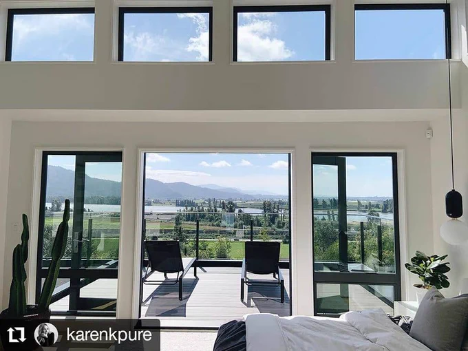 A beautiful home post by @karenkpure with a Westeck custom Patiio Opening and transom windows.