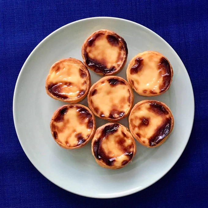 A plate containing 7 pastéis de nata