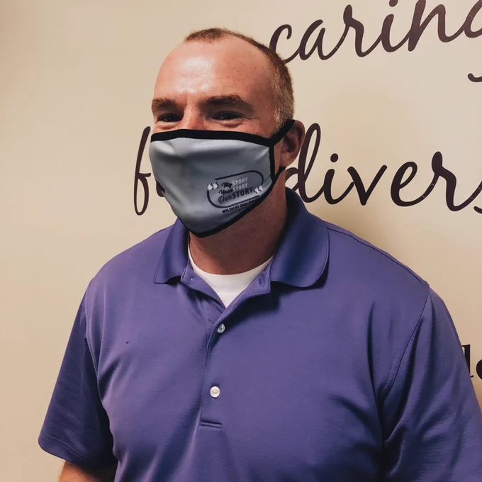 Mike wearing mask