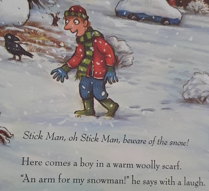 Page from child book. Text reads 'Here comes a boy in a warm woolly scarf. An arm for.my snowman he says with a laugh.
