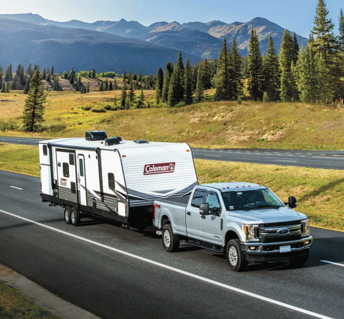 The family-friendly Coleman Lantern 337BH three-slide travel trailer tows easily but has plenty of room for the crew at the campground. 