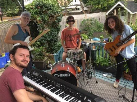 Junestone band musicians on back porch