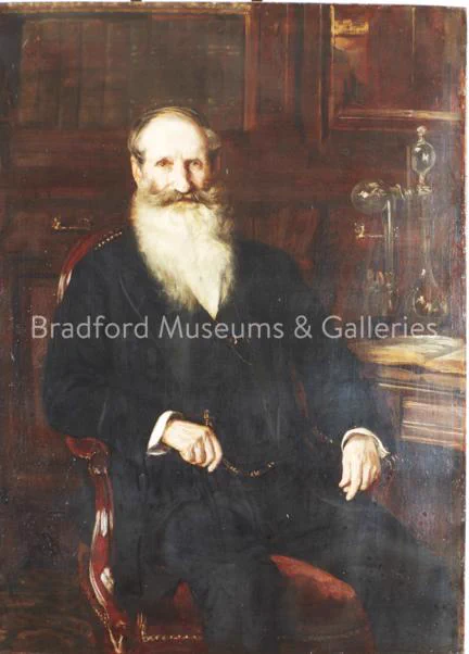 Portrait of Isaac Holden by James Charles. Oil on canvas. In Bradford Museums and Galleries collection. Portrait shows Isaac Holden as a older man sat on a chair at a desk. 