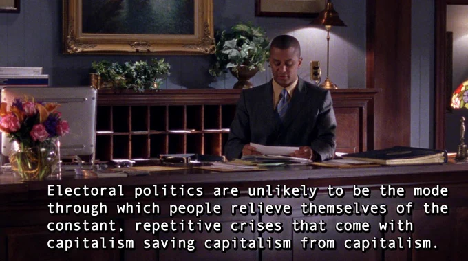 A Ruth Wilson Gilmore quotation about abolition is the caption for a still from the popular television program Gilmore Girls. The caption states: "Electoral politics are unlikely to be the mode through which people relieve themselves of the constant, repetitive crises that come with capitalism saving capitalism from capitalism." 