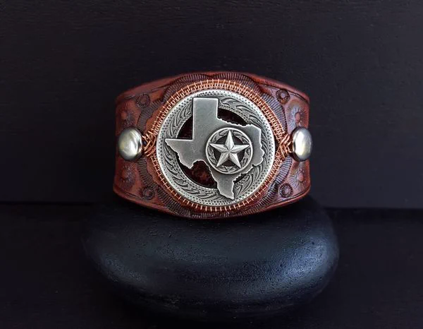 Handmade leather bracelet, State of Texas focal. Taking orders. www.WorkOfArtStudios.com Artist Daune Price-Hannah #handmadegifts #madeintexas #leatherbracelet 