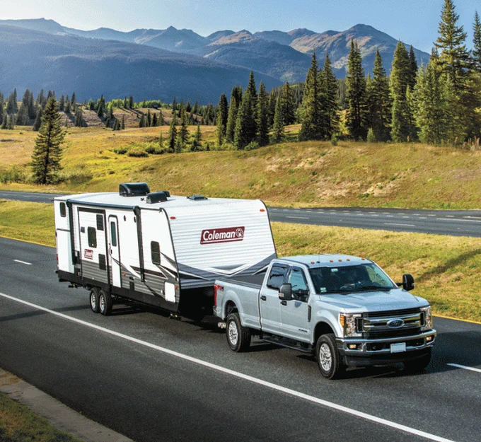 Coleman Lantern 337BH three-slide travel trailer tows easily but has plenty of room for the crew at the campground. 