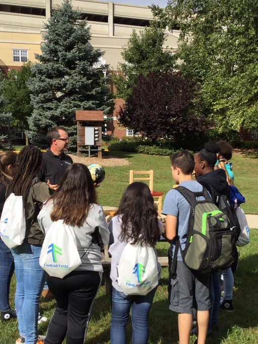 High school students learning about wood