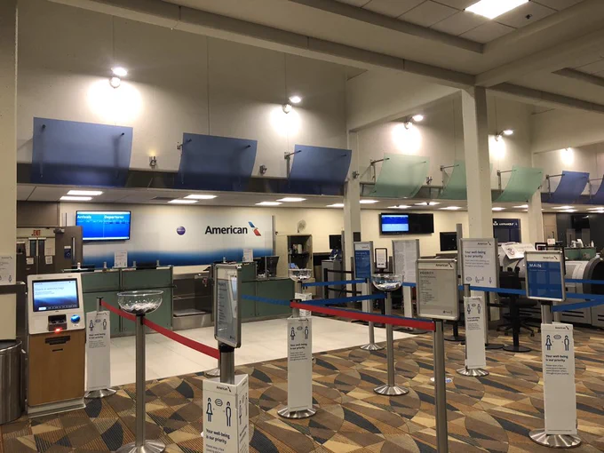 American Airlines check-in counter at airport.