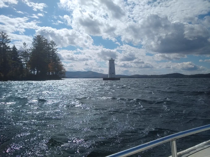 Herrick Cove lighthouse at Lake Sunapee, NH, on a windy day