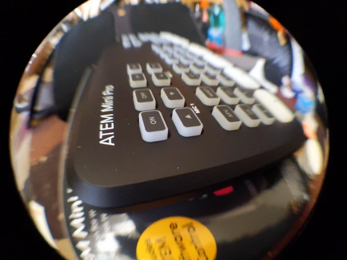 Distorted fisheye lens photo of ATEM mini pro video mixer.