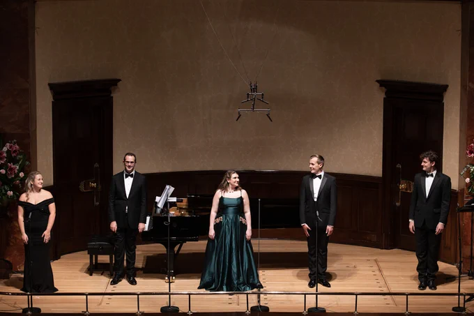 Samantha Quillish, Christopher Glynn, Lauren Young, Glen Cunningham and William Thomas stand on the Wigmore Hall stage, to take their bows after the Independent Opera 2020 Scholars' Recital.