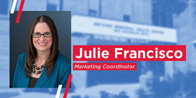 Portrait of  Watkins marketing coordinator with Watkins Memorial Health Center in the background. Text reads: Julie Francisco, Marketing Coordinator.
