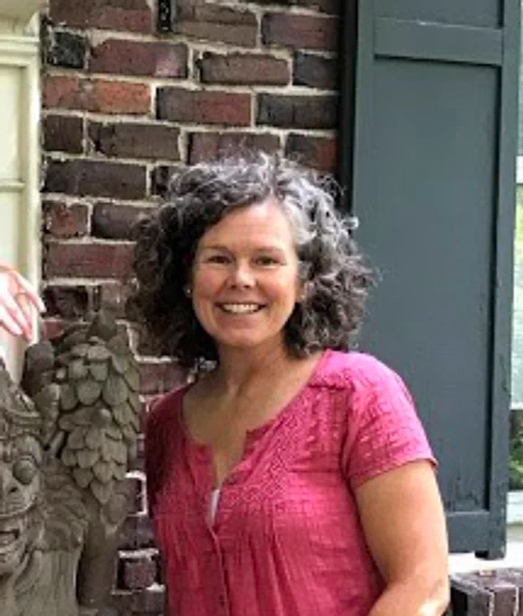 Woman smiles for camera