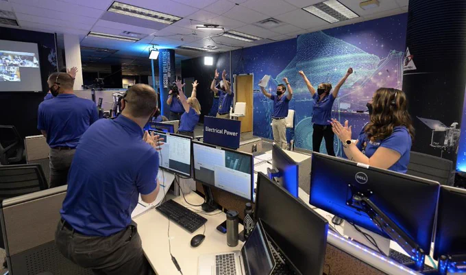OSIRIS-REx mission team members at Lockheed Martin's facility in Colorado celebrate success