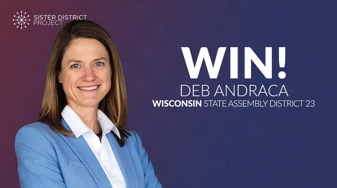 A red to blue gradient background with a picture of our candidate Deb Andraca. On the left corner is a white Sister District logo. To the right of Deb the text says, “WIN! Deb Andraca Wisconsin State Assembly 23”. 

